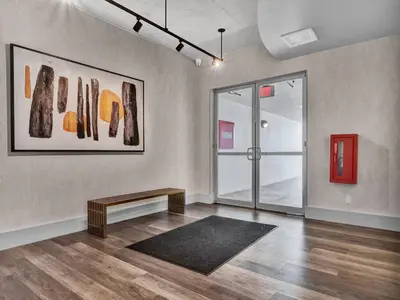 an empty room with a table and a glass door at Luxury 1260sq ft 2 Bd 2BTH in DT in Orlando