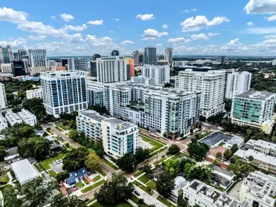 an aerial view of a city with tall buildings at Luxury 1260sq ft 2 Bd 2BTH in DT in Orlando