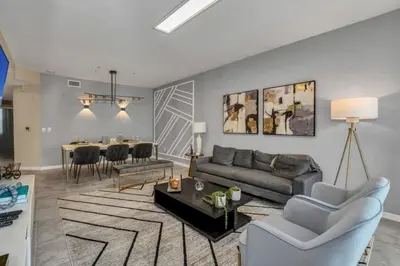 a living room with a couch and a table at 3180 Para unit 101 townhouse in Kissimmee