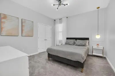 a bedroom with a bed and a ceiling fan at Amazing 15 Bedroom house at Veranda Palms 2395RAMA villa in Kissimmee
