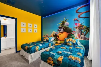 a room with two beds with a goofy bedroom at Amazing 15 Bedroom house at Veranda Palms 2395RAMA villa in Kissimmee