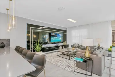 a living room with a couch and a table at 4552Target home in Kissimmee