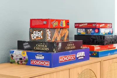 a stack of boxes of snacks on a shelf at 5BD Moana-Themed - Movie by the Pool - Near Disney in Orlando
