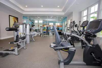 a gym with several treadmills and cardio machines at RCT Dreamstay in Orlando