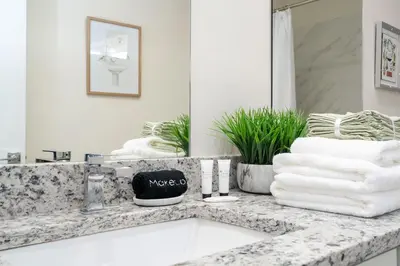 a bathroom with a sink and a mirror at RCT Dreamstay in Orlando