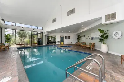 a large swimming pool in a hotel lobby with at 29-Universal, International Dr,Convention Center in Orlando