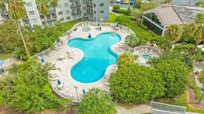 an overhead view of a swimming pool at a resort at 14-Near Universal Studios Amazing View in Orlando