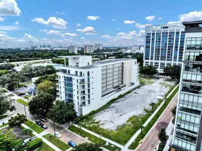 an aerial view of a city with tall buildings at Extra Large 1 Bdrm Condo & Gym in Orlando