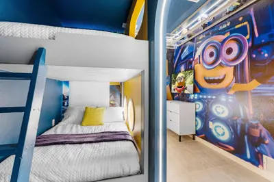 a bedroom with a bunk bed with a goofy mural at BRAND Themed Luxury 5Bedrooms At Paradiso Grande in Orlando