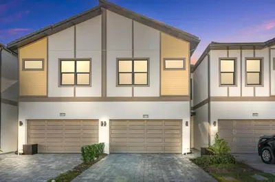 a rendering of a house with a garage at BRAND Themed Luxury 5Bedrooms At Paradiso Grande in Orlando