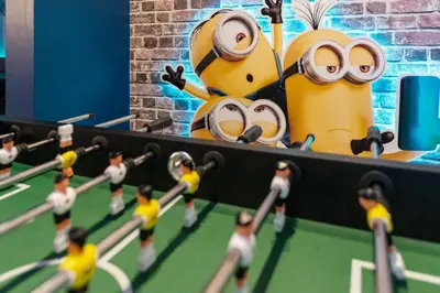 a toy figurines of a table tennis game at Brand New Home 9 Bedrooms5 Baths At Storey Lake in Kissimmee