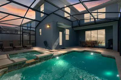 a swimming pool in a house with a house at Amazing 5Bdrms At Storey Lake in Kissimmee