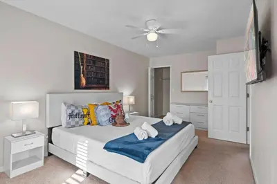 a bedroom with two beds and a ceiling fan at Sweet 3 bedroom Townhome 2407 in Orlando