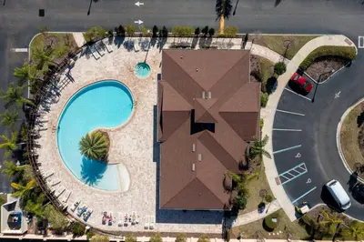 an overhead view of a house with a swimming pool at Modern 3 Bed Villa Newly Renovated Prime Location in Kissimmee