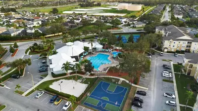 an aerial view of the pool at the resort at Lux 6BrVilla -Pool&ResortAmenities -10mins to Parks in Kissimmee