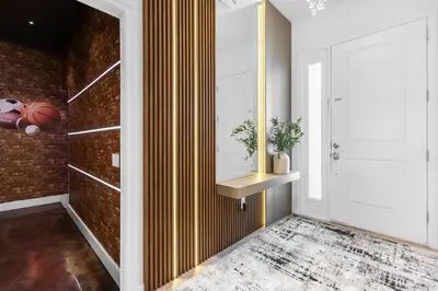 a hallway with a brick wall and a basketball hanging on the wall at Brand NEW 9Bedrooms9Bathrooms At Paradiso Grande in Orlando