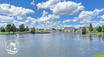 a view of a lake with houses in the background at Villas Standard Seven Dwrafs Resort - Close to Disney in Kissimmee