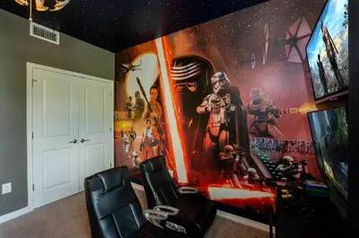 a room with a star wars mural on the wall at Themed 3-bed 2 bath condo at Storey Lake Resort in Kissimmee
