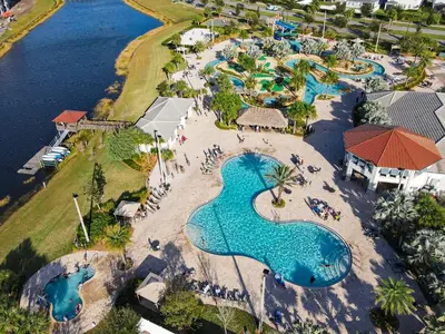 an aerial view of a swimming pool at a resort at Themed 3-bed 2 bath condo at Storey Lake Resort in Kissimmee
