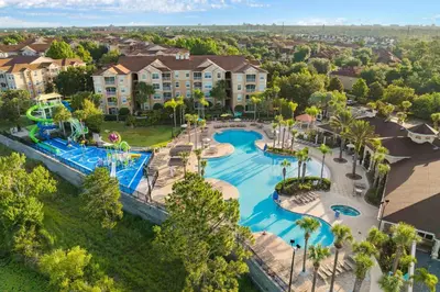an aerial view of a pool at a resort at Amazing House Amazing Amenities in Orlando