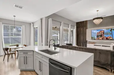 a kitchen with a sink and a counter top at Free Water Park Luxury Living in Orlando