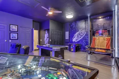 a room with a pool table and a ping pong table at Free Water Park Luxury Living in Orlando