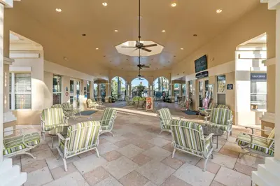 a dining room with chairs and a table at Elegant Townhome w Water Park near Disney Parks in Orlando