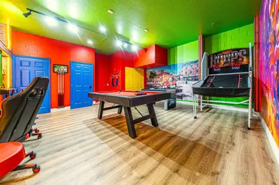 a play room with a ping pong table and a pool table at NEW Spectacular Home Windsor Hills in Orlando