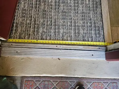 a yellow measuring tape sitting on top of a floor at Vacation Home near Disney World! in Kissimmee
