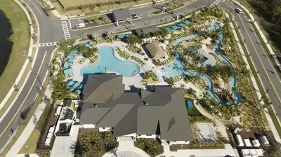 an aerial view of a pool at a resort at Storey Lake 4Q/3B acesso Resort e Piscina Priv. in Kissimmee