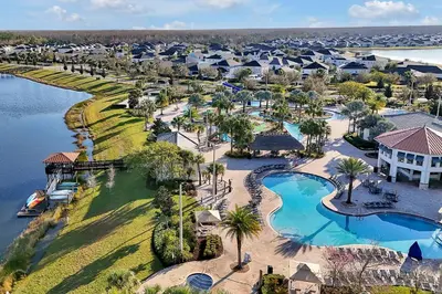 an aerial view of a resort with a pool at Storey Lake Home: Pool, Gym, Lazy River & near Disney in Kissimmee