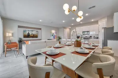 a dining room and living room with a table and chairs at Formosa Valley Resort 59 - Hosted by Top Villas in Orlando