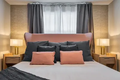 a bedroom with a large bed with two pillows at Formosa Valley Resort 60 - Hosted by Top Villas in Orlando