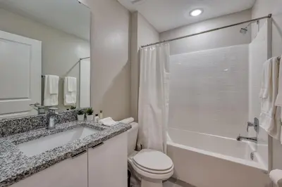 a bathroom with a toilet and a sink and a shower at Formosa Valley Resort 60 - Hosted by Top Villas in Orlando