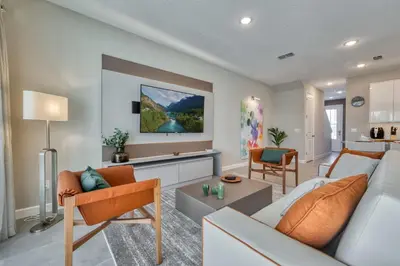 a living room with a couch and a table at Formosa Valley Resort 61 - Hosted by Top Villas in Orlando