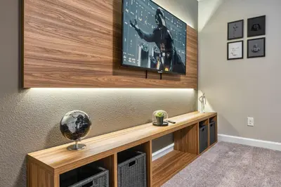 a living room with a tv on a wall at Formosa Valley Resort 62 - Hosted by Top Villas in Orlando