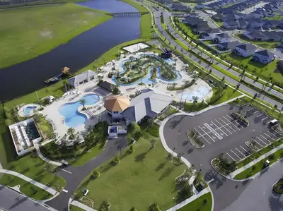 an aerial view of a resort next to a body of water at Beautiful 5bed home with Free Resort Access 4817 in Kissimmee