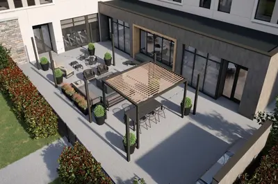 an overhead view of a patio with a table and benches at Staybridge Suites Clermont Southeast by IHG in Clermont