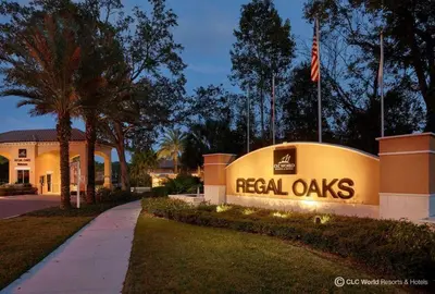 a real oaks sign in front of a building at Corvette Getaway - 2 beds - jacuzzi - Forest view in Orlando