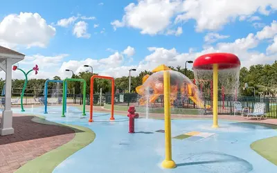 a water park with a fountain with a fire hydrant at 3 Bedroom 2 Bathroom Villas At SevenDwarfs 8-103 in Kissimmee