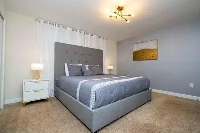 a bedroom with a bed and a ceiling fan at Great Home Mickey & Harry Potter Beds Top Spot in Kissimmee