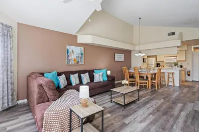 a living room with a couch and a table at 2721 North Poinciana #164 in Kissimmee