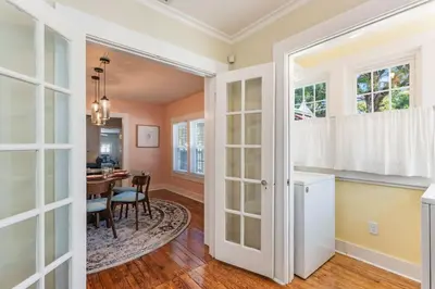 a kitchen and dining room with a table and a window at Sanford's Haven, 3 Bedroom, Sleeps 7 in Sanford