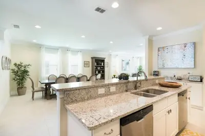 a kitchen with a sink and a counter top at Fabulous Disney Vacation Home in Orlando