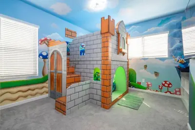 a childs room with a castle wall mural at Relax at Paradiso Grande Resort in Orlando