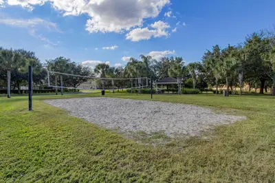 a volleyball court in a park at Personally Designed Home w/ Pool, Game Room near Disney in Orlando