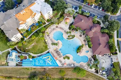 an overhead view of a pool at a resort at Personally Designed Home w/ Pool, Game Room near Disney in Orlando