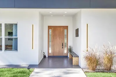 a front door of a white house at Florida HappyNest Secluded Luxury Guesthouse in Kissimmee