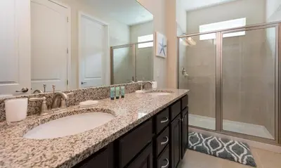 a bathroom with a sink and a shower at 7412 MA - Stylish Home Near Parks in Orlando