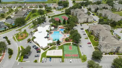 an aerial view of a parking lot at a resort at 2306 SP - Disney Paradise 2BR Villa, Near Magic & More in Kissimmee